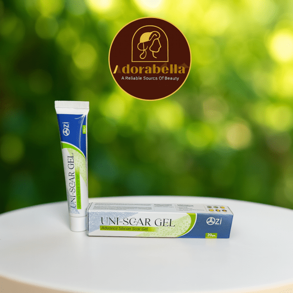 Uni-Scar Gel 20gm tube and box on white table with Adorabella logo and green natural background