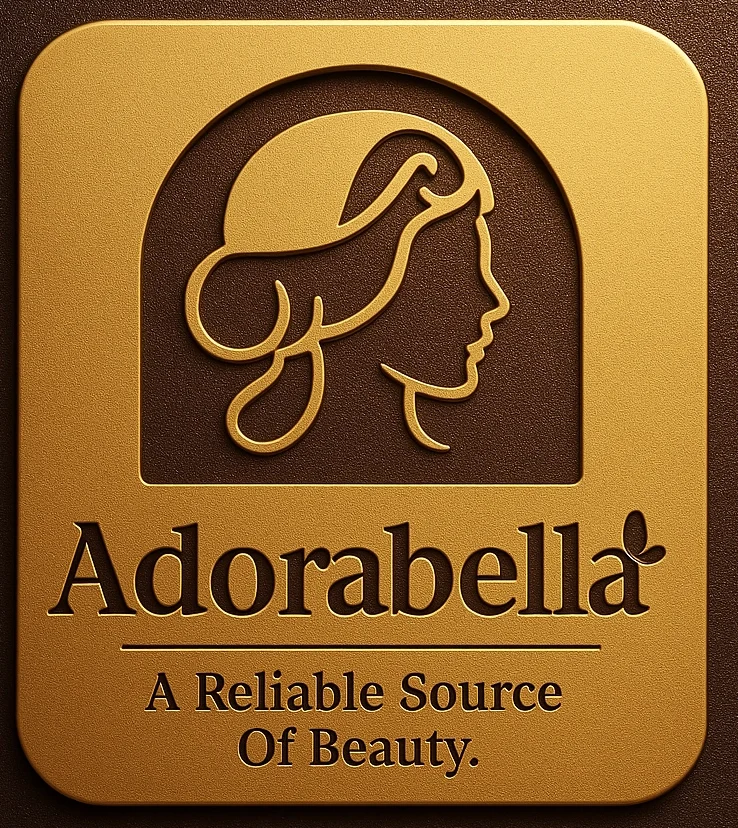 Home 1 Adorabella logo – gold embossed profile of a woman with the tagline “A Reliable Source of Beauty.